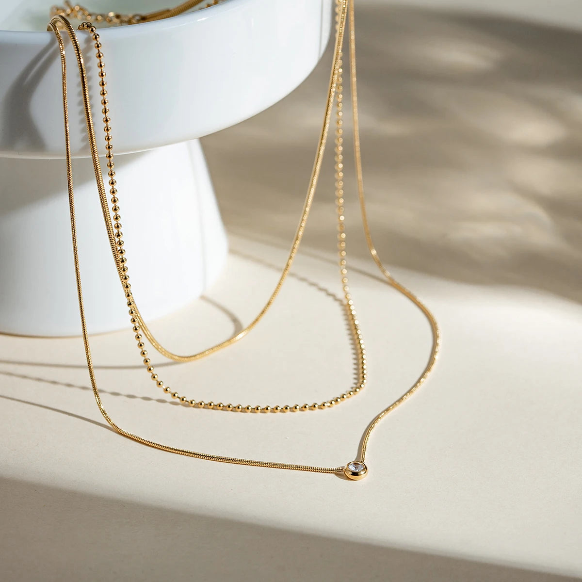 Collier triple chaîne – Superpositions délicates