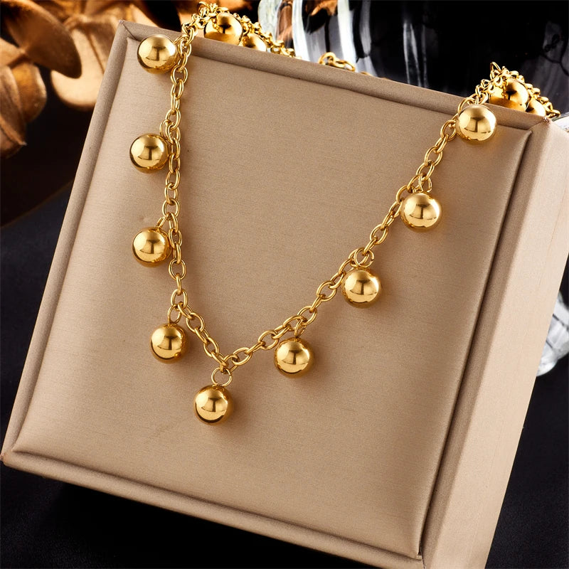 Collier ras-du-cou boule géométrique