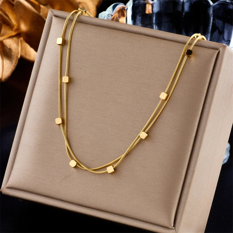Collier ras-du-cou boule géométrique