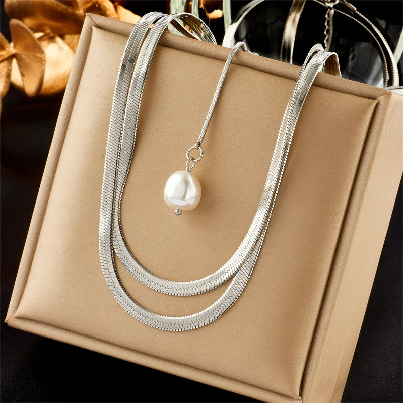 Collier ras-du-cou boule géométrique