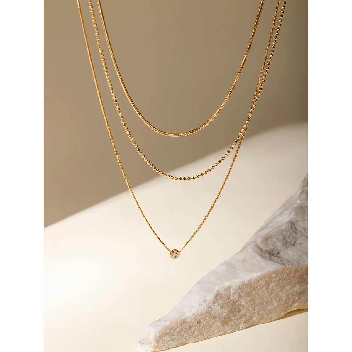 Collier triple chaîne – Superpositions délicates