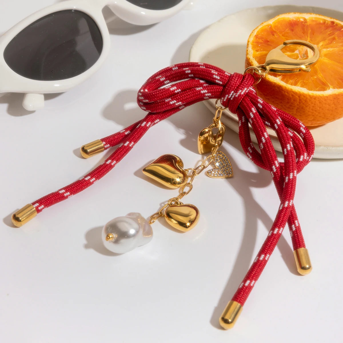 Pendentif nœud rouge & perle – Accessoire sac ou bijou
