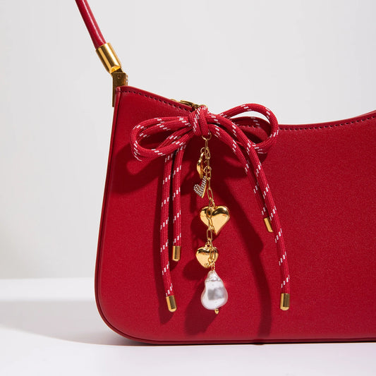 Pendentif nœud rouge & perle – Accessoire sac ou bijou